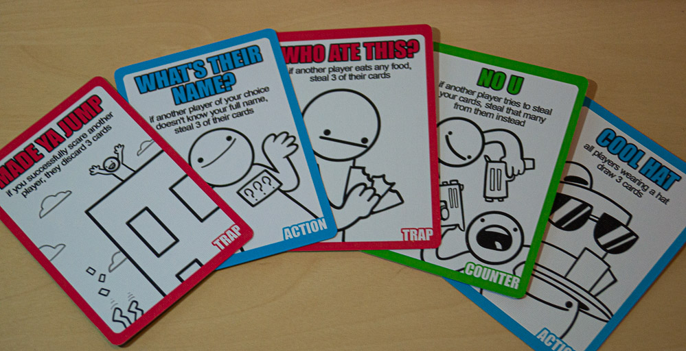 5 cards laid out on a table.